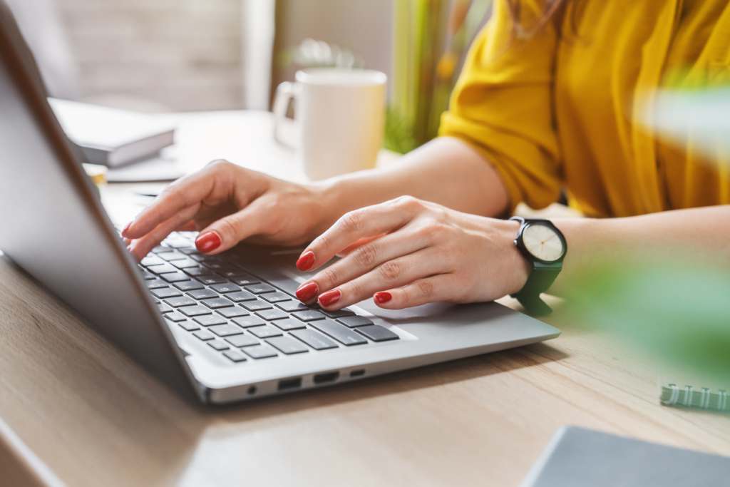TNAA’s BSN Scholarship Winner for Fall 2022: Kaylee K. Cropped image of business woman hand working laptop computer in home office